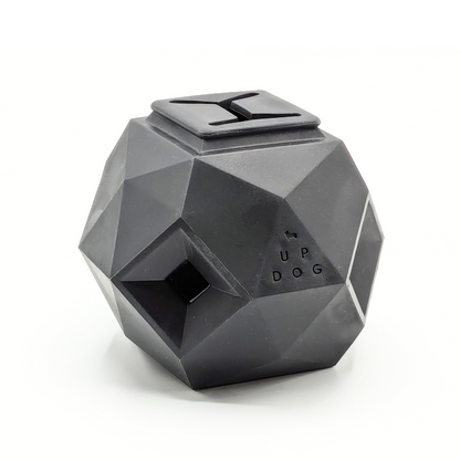 Up Dog Odin Treat Puzzle Ball in slate grey, angled view of the faceted shape, top fill slot and side treat openings