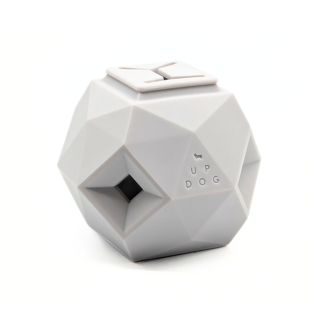 Up Dog Odin Treat Puzzle Ball in light grey, angled view on a white background