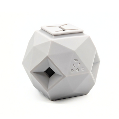 Up Dog Odin Treat Puzzle Ball in light grey, angled view on a white background