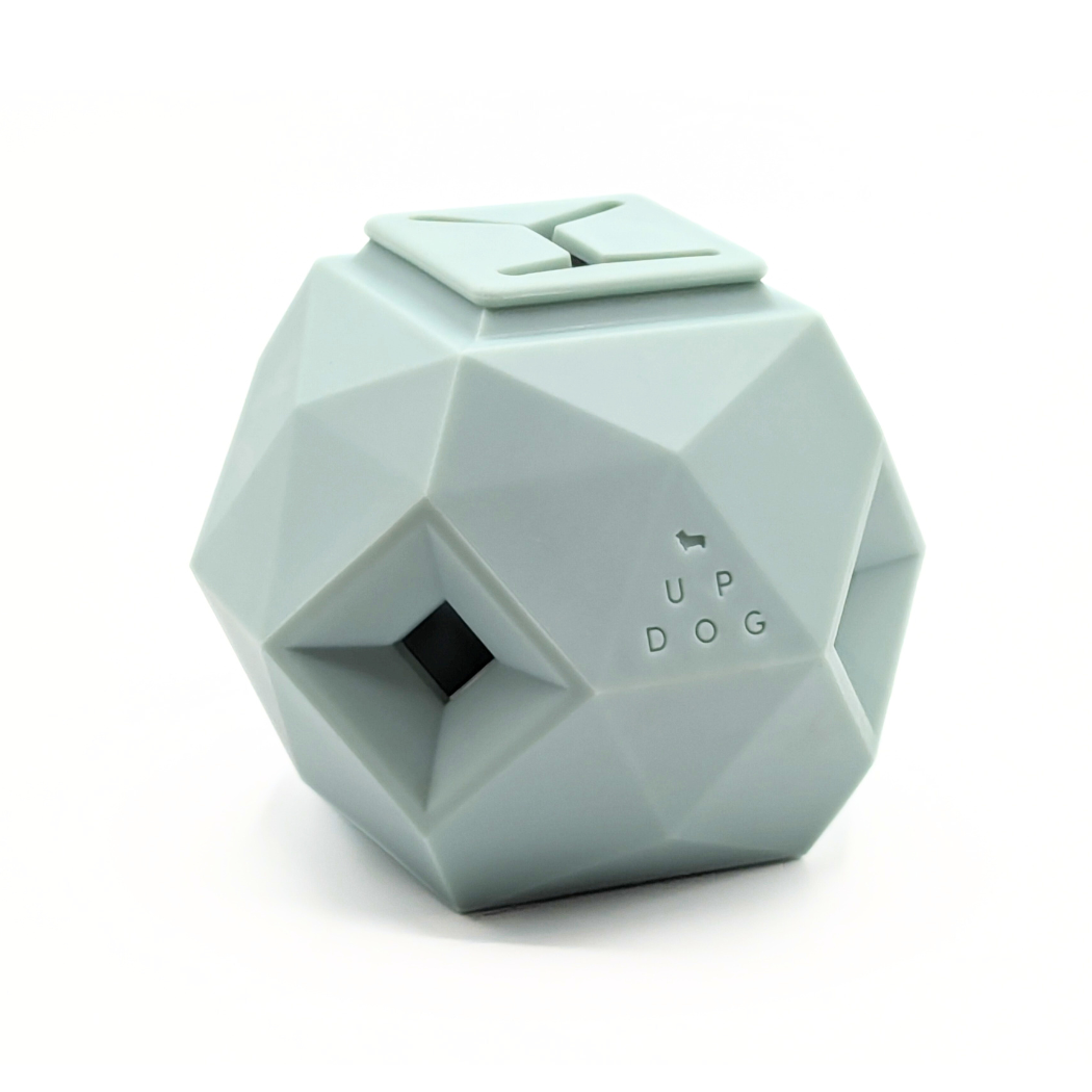 Up Dog Odin Treat Puzzle Ball in mint green, angled view on a white background