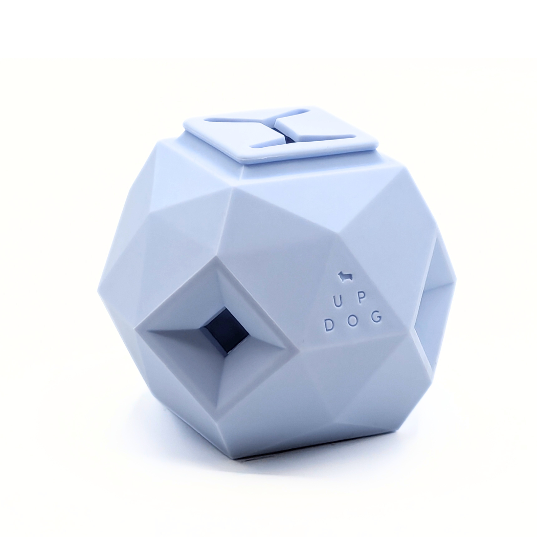Up Dog Odin Treat Puzzle Ball in powder blue, angled view on a white background