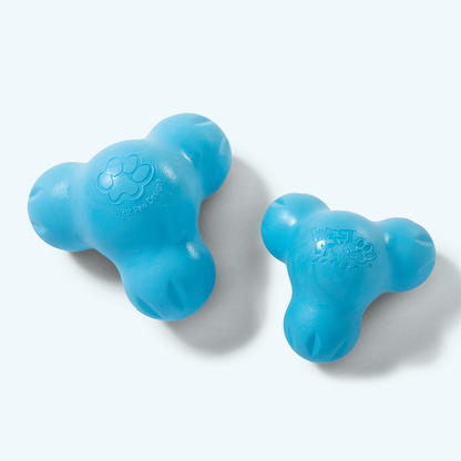 Tux treat toys in aqua blue in two sizes, back view of the solid side with the paw print logo
