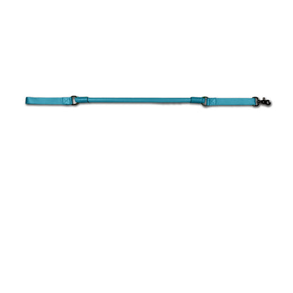 Urban Walk'r Short Stretch Leash in blue laid flat, handle at left and snap clip at right