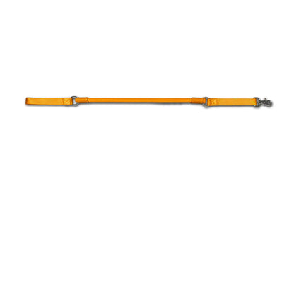 Urban Walk'r Short Stretch Leash in orange laid flat, handle at left and snap clip at right