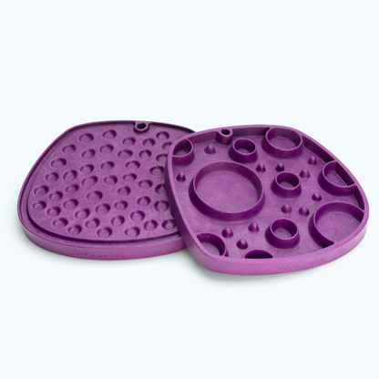 Bubbles Feast Mat in tropic red, a deep magenta shade, showing the lick-mat side and slow-feeder side