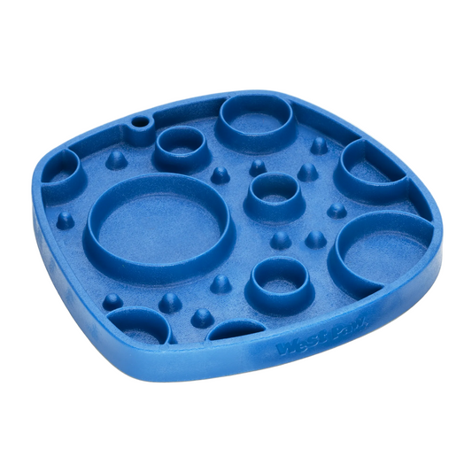 West Paw Bubbles Feast Mat slow feeder in marine blue, angled view of the round wells and raised nubs