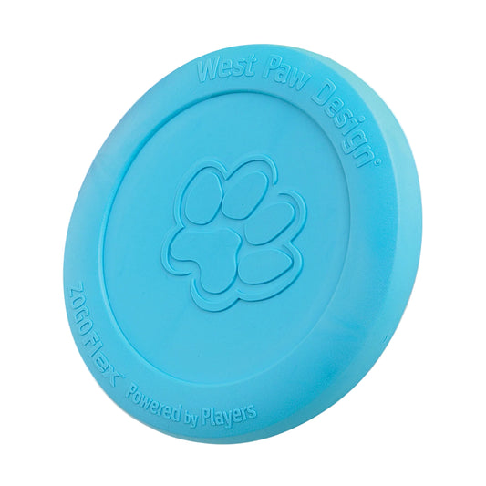 West Paw Zisc flying disc in aqua blue, standing on its edge to show the embossed paw print and rim lettering