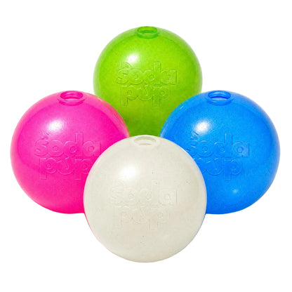 SodaPup Glitter Ball in all four colors, pink, blue, green and glow in the dark, grouped with their treat holes up