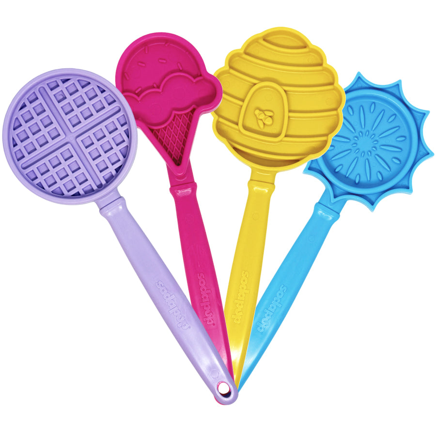 eStick lick sticks in all four designs fanned out: purple waffle, pink ice cream cone, yellow beehive and blue flower
