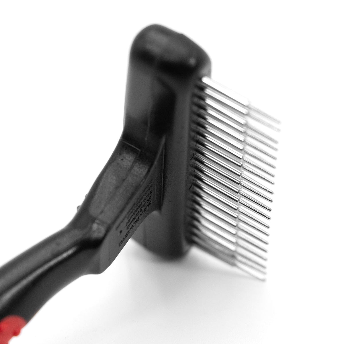 Side close-up of the wider 20-pin Jeffers Magic Spring rake head, showing the steel pins