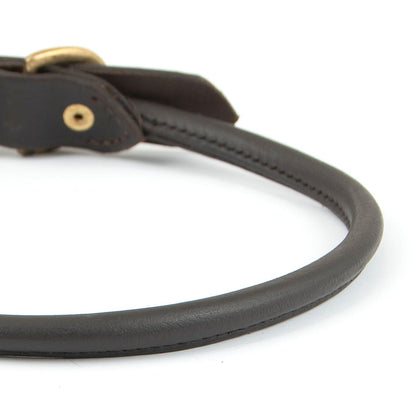 Jeffers rolled leather dog collar, close-up of the round rolled leather and stitched seam beside a brass rivet