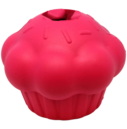 SodaPup Cupcake treat dispenser in pink natural rubber, a frosted cupcake shape with molded sprinkles, on white