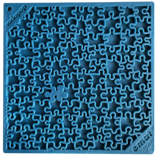 SodaPup Jigsaw eMat lick mat in blue, top view of the 8 inch square with interlocking puzzle-piece grooves, on white